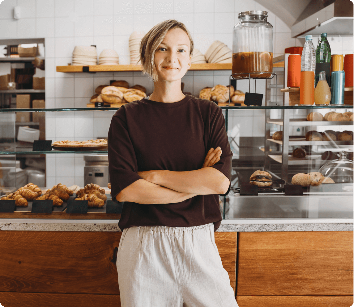 Woman posing in bakery