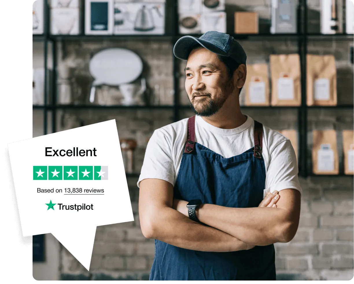 Stock image of a smiling small business owner in apron standing in a coffee shop, next to a Trustpilot badge showing excellent rating